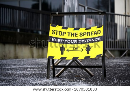 Stop the spread keep your distance sign during the pandemic