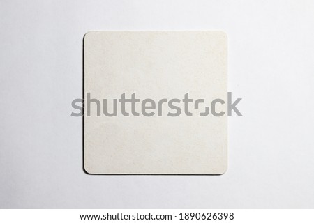 White color coaster. İsolated for beer or other drinks, cleaned for message Royalty-Free Stock Photo #1890626398