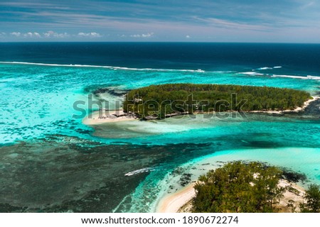 View from the height of the east coast of the island of Mauritius in the Indian Ocean. Beautiful lagoon of the island of Mauritius,