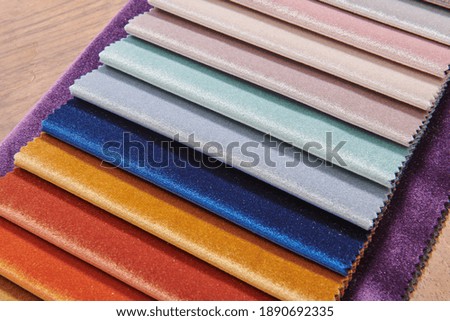 Bright collection of textile samples. Multicolor fabric texture background