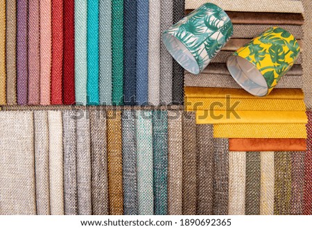 Bright collection of textile samples. Multicolor fabric texture background