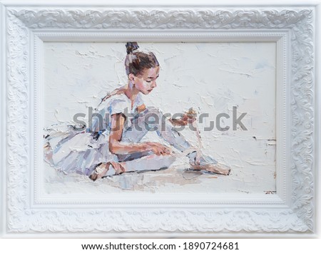 A young ballerina in light tutus prepares for performances. The background is white. Framed oil painting on canvas.