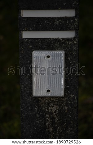 reflector on concrete pole for safety