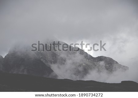 Foggy Andes in the Cumbre in La Paz, Bolivia. This scenery shows us the magnificent mountains of the Andes, covered by clouds with their textures.