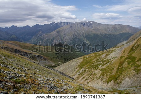Rocky pass with scarce vegetation Karatyurek in the Altai mountains.