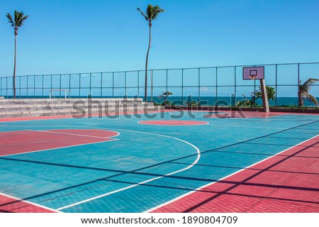 Basketball court on a sunny day.