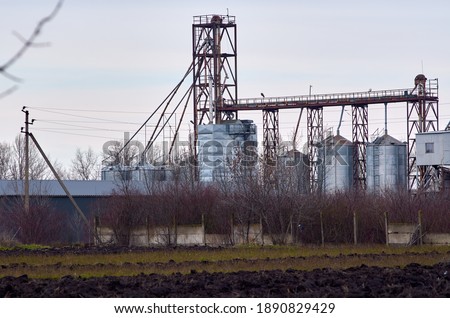 Photo of modern feed plant in countryside