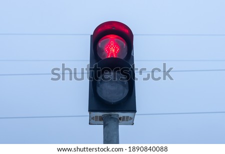 Red signal or stoplight on traffic light. Stop sign.