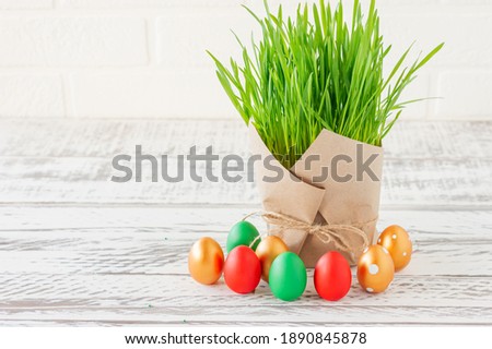 Happy Easter. Colorful Easter eggs in a basket. Easter background with copyspace.