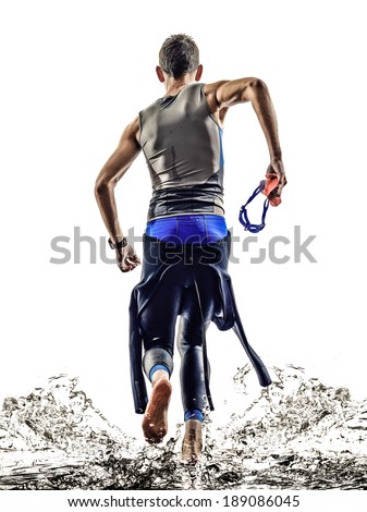 man triathlon iron man athlete swimmers swimmers running  in silhouettes on white background