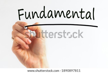 Hand writing inscription Fundamental with black color marker, concept, stock image
