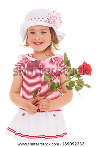  Charming little girl in sailor dress with red rose flower. The concept of a happy childhood.Isolated on white background.