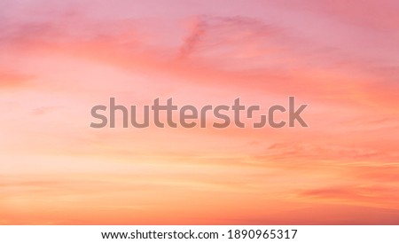 Evening Sky,Pink sky background with Romantic colorful sunlight with orange, yellow and dramatic nature background. Royalty-Free Stock Photo #1890965317