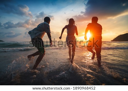 Friends playing on beach, Koh Kut Thailand Royalty-Free Stock Photo #1890968452
