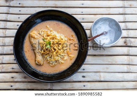 The pattern Thai noodle curry soup (name khao sawy)