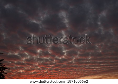 picture of dark pink blue clouds in evening. himachal pradesh india.
