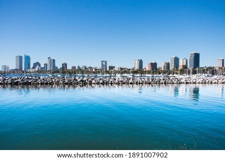 Skyline of Milwaukee, Wisconsin with Lake Michigan in the foreground.