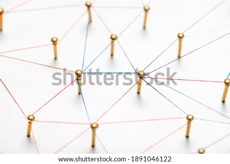 abstract web line connection of color yarn from nail node to node on white background , networking concept Royalty-Free Stock Photo #1891046122