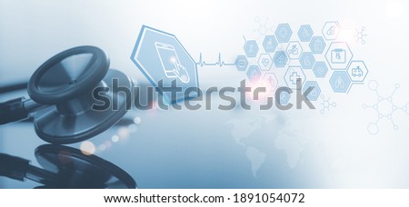 Medical technology background, telemedicine virtual hospital, online medical concept. Patient connecting online doctor via smart phone with medical icons network connection on virtual screen interface Royalty-Free Stock Photo #1891054072
