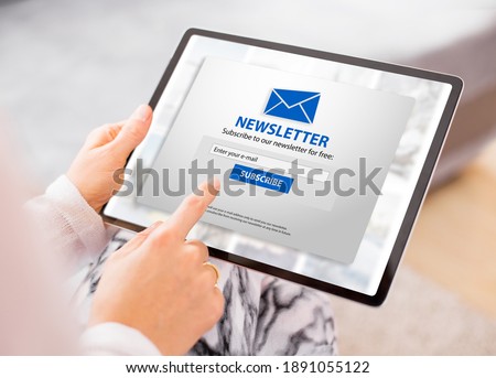 Woman subscribing to weekly newsletter online