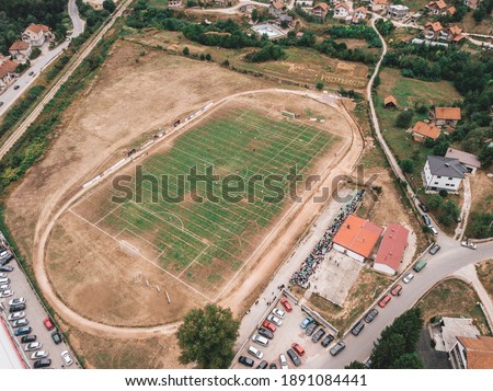 Aerial images of the local soccer field. Summertime picture when the grass is not green, it is damaged from the sun.