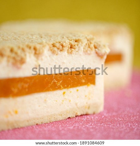 A slice of cheesecake with tangerine filling. Healthy organic summer cake dessert. Dessert. Photo.