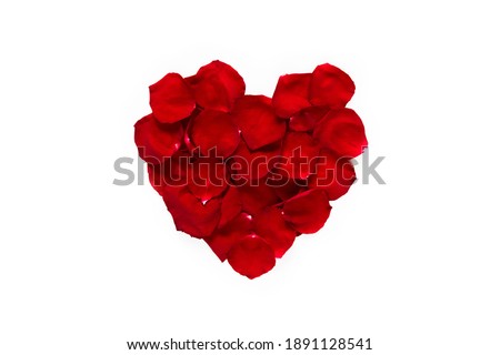 Heart of red rose flower petals isolated on white background. Top view, Flat lay. Beautiful Floral object for design greeting card to Valentine's Day, anniversary, wedding, Birthday. Love concept