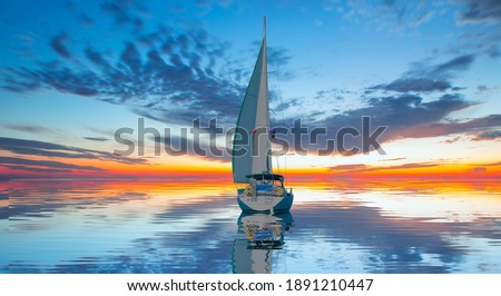 Sailing Yacht from sail regatta on mediterranean sea at sunset - Sailing luxury yacht with white sails in the Sea. Royalty-Free Stock Photo #1891210447