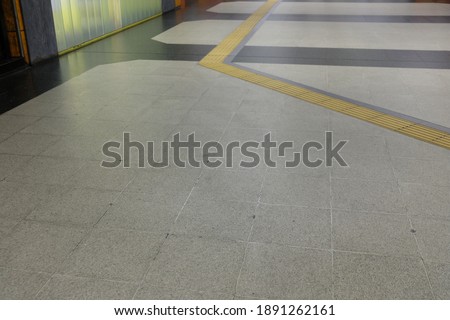 view of the floor in a pedestrian passageway
