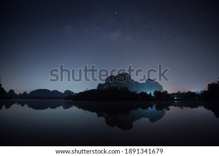 A star at nigh sky with cloudy at night time Royalty-Free Stock Photo #1891341679