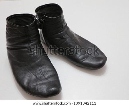 Waterproof leather socks for ablution. Wudu Socks.  Royalty-Free Stock Photo #1891342111