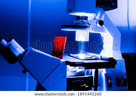 Fluorescence microscope in blue light  Royalty-Free Stock Photo #1891445260