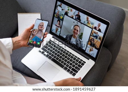 Beautiful young woman having video conference call via computer. Call Meeting. Home office. Stay at home and work from home concept during Coronavirus pandemic Royalty-Free Stock Photo #1891459627