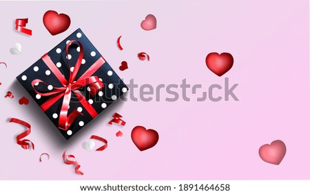 Composition for Valentine's Day February 14th. Delicate pink background and pink hearts cut out of paper. Greeting card. Flat lay, top view, copy space.