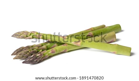 Fresh asparagus  isolated on white background Royalty-Free Stock Photo #1891470820