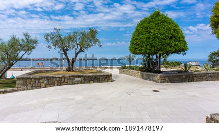 Bernardinska Reber - View of the Adriatic Sea from the foot of the 'Church of St Bernardine'. In the foreground of the picture are the green trees of the park. Portoroz, Slovenia, June 2020. csabaprog