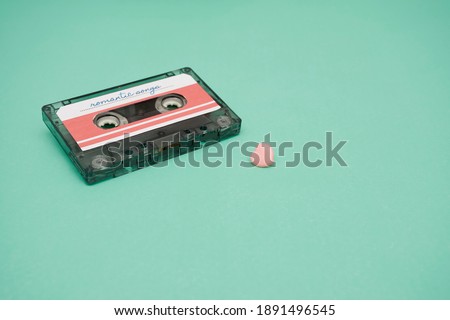 audio cassette on water green background