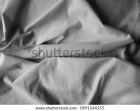 Fabric, folds of white fabric. Background for design and presentation.