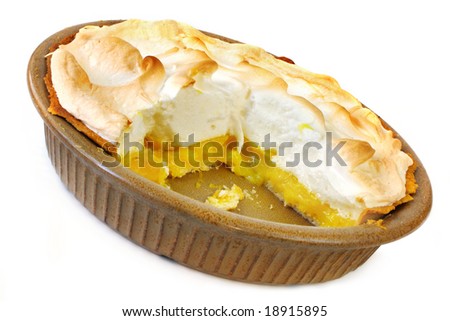 Home-baked lemon meringue pie, with a slice cut out.  Old-fashioned pottery pie plate, isolated on white.