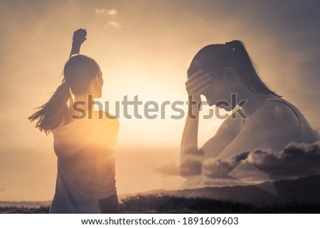 Strong woman overcoming her darkest fears. Winning, mental health ,and religious concept. Double exposure 
 Royalty-Free Stock Photo #1891609603