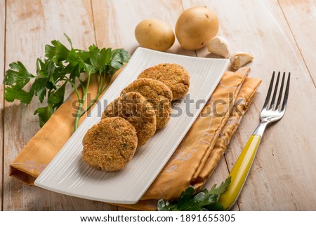 fish croquettes with garlic and potatoes