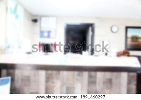 unfocused blur view of front desk of hotel,motel,travel business office as background