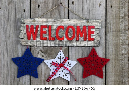 Welcome sign with red, white and blue stars