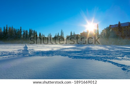 National park High Tatras winter sunrise view and mountain Vysoka over Strbske lake, Slovakia