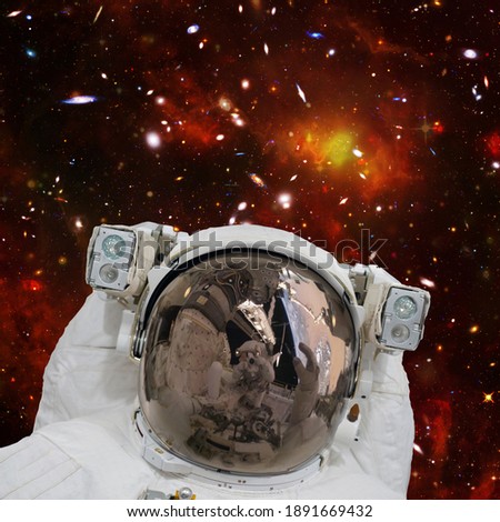 Astronaut and light. Science theme.  The elements of this image furnished by NASA.

