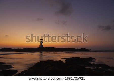 sunset on the rock beach