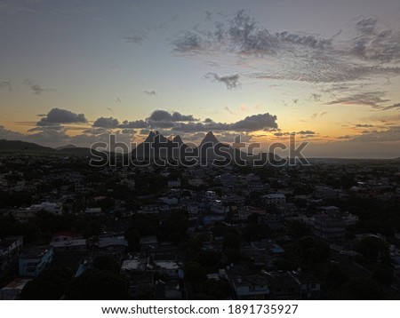 Aerial view of 'Trois Mamelles' mountain from 'Vacoas' town during sunset
