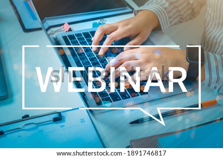 Person using a laptop computer for online training webinars. E-learning browsing connection and cloud online technology webcast concept. Royalty-Free Stock Photo #1891746817