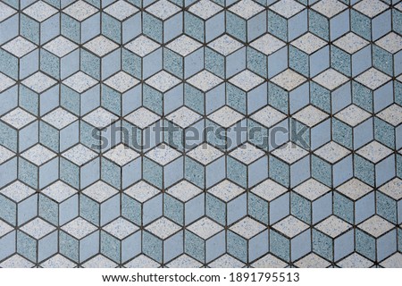 Antique Geometric tiled floor in Singapore. texture of tiles. Stock Photo.