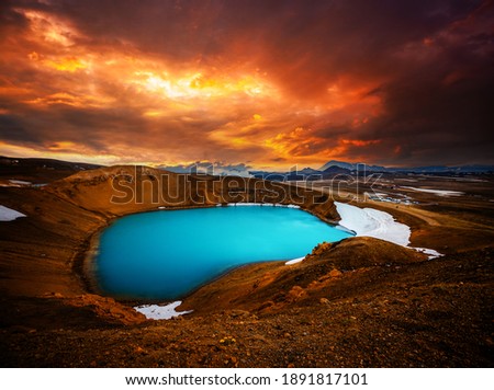 Picturesque view of the lake with azure water in the crater of Krafla volcano. Location place valley Leirhnjukur, Myvatn lake, Iceland. Image of exotic world landmarks. Discover the beauty of earth.